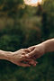 closeup-loving-couple-holding-hands.jpg
