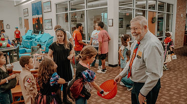 Mendell giving out candy.JPG