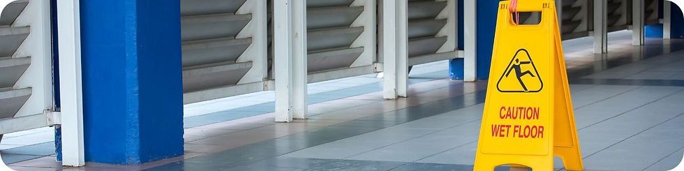 Small image of a wet floor sign in an airport terminal.