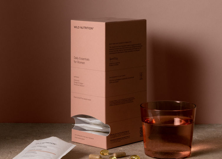 Radiant essentials: A warm image capturing the essence of Wild Nutrition's women's daily essentials, promoting wellness and vitality