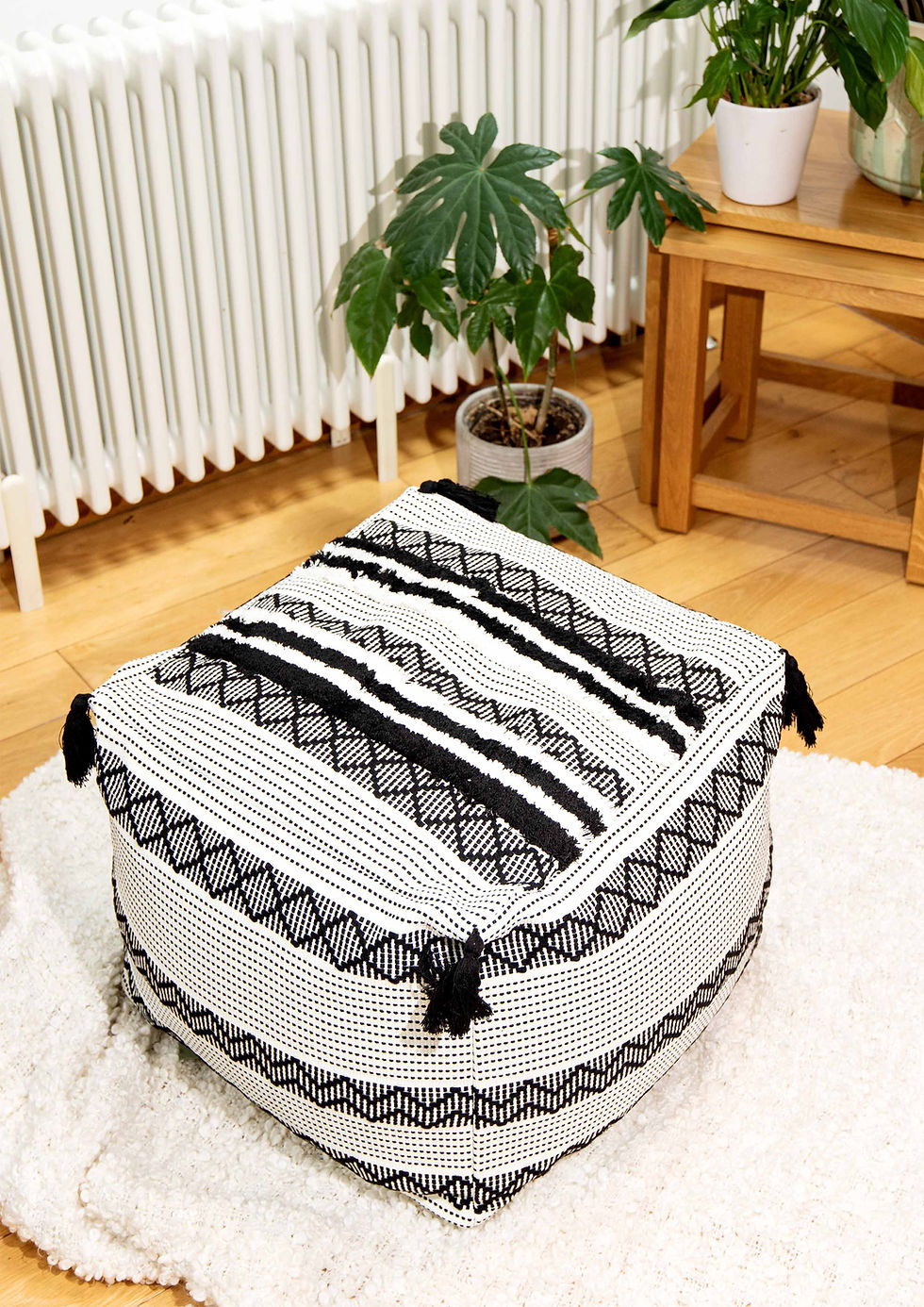 The Nila Black Pouffe