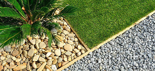rock drain with sod grass