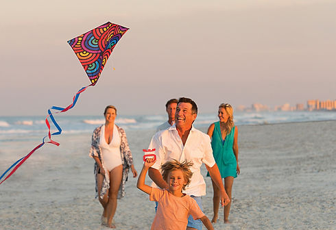 Family_Flying_a_Kite_at_the_Beach1.jpg