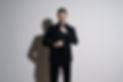 young-handsome-businessman-black-shirt-black-suit-2.jpg