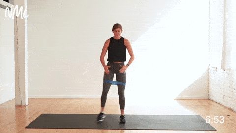 Squats with band around thighs.gif
