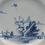 Thumbnail: 18th Century English Delftware Dish - Boy Chasing Insect - detail