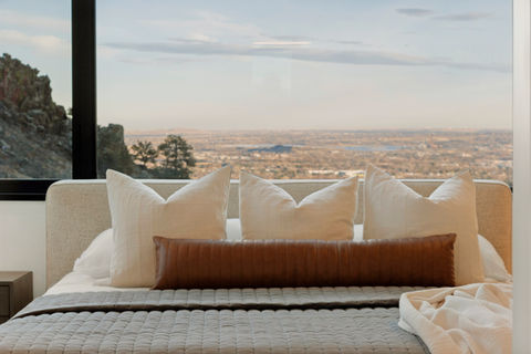 Luxury Airbnb bedroom photography in Denver featuring clean design, natural light, and high-end finishes