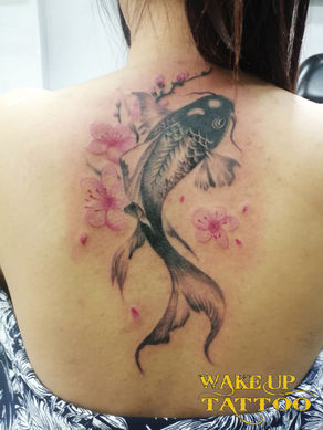 Koi fish with cherry blossoms tattoo | Phuket Patong | Wake up Tattoo