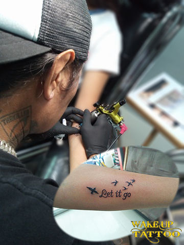 writing tattoo by Wake up Tattoo Phuket