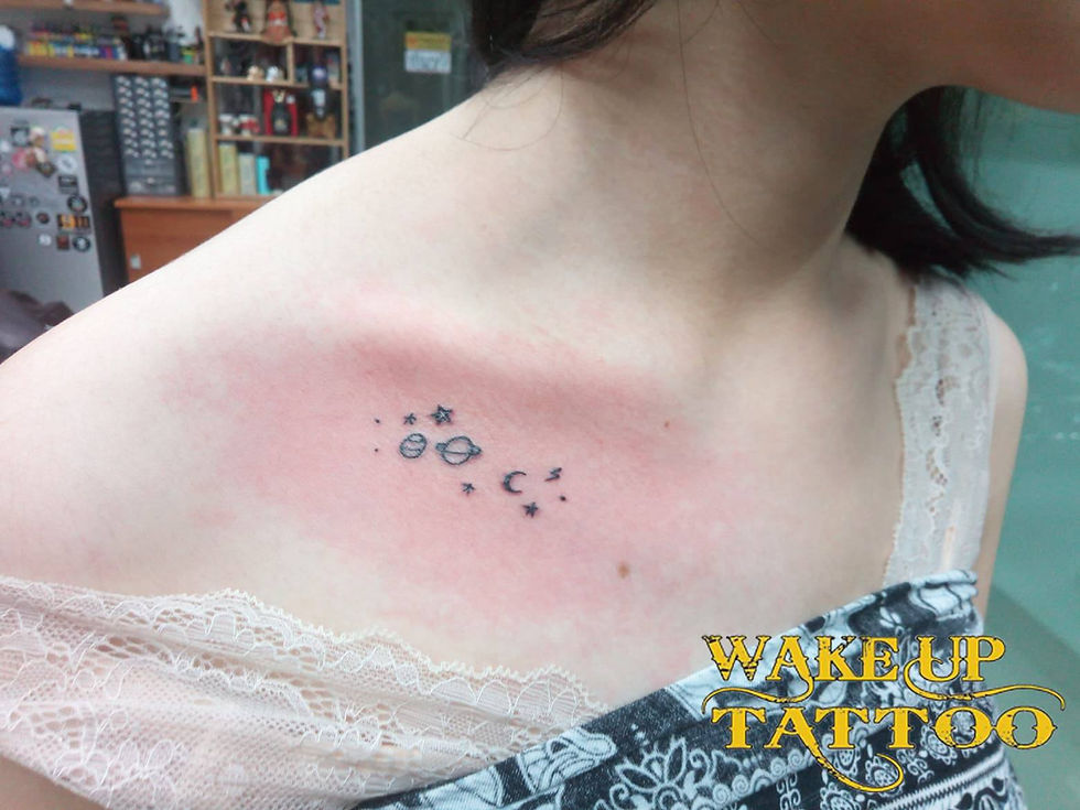 Space tattoo by Wake up Tattoo Phuket at Patong Beach