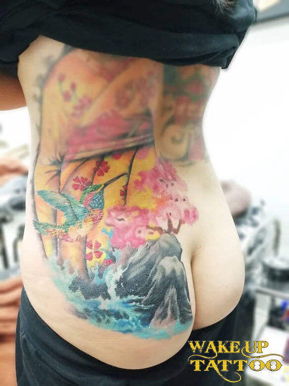 Japanese design tattoo on the back by Wake up Tattoo Phuket