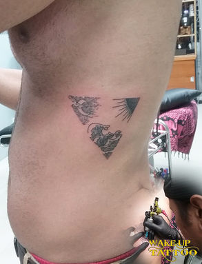 Triangle tattoo by Wake up Tattoo Phuket at Patong Beach Thailand