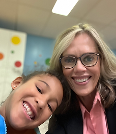 Miss Mary APA tutor with student 