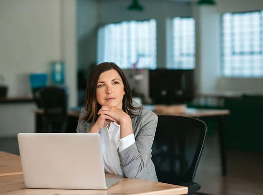 Woman leader contemplating Mary Printz Coaching