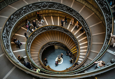 People walking up and down the spiral staircase at the Vatican Museum Vatican City Photogr