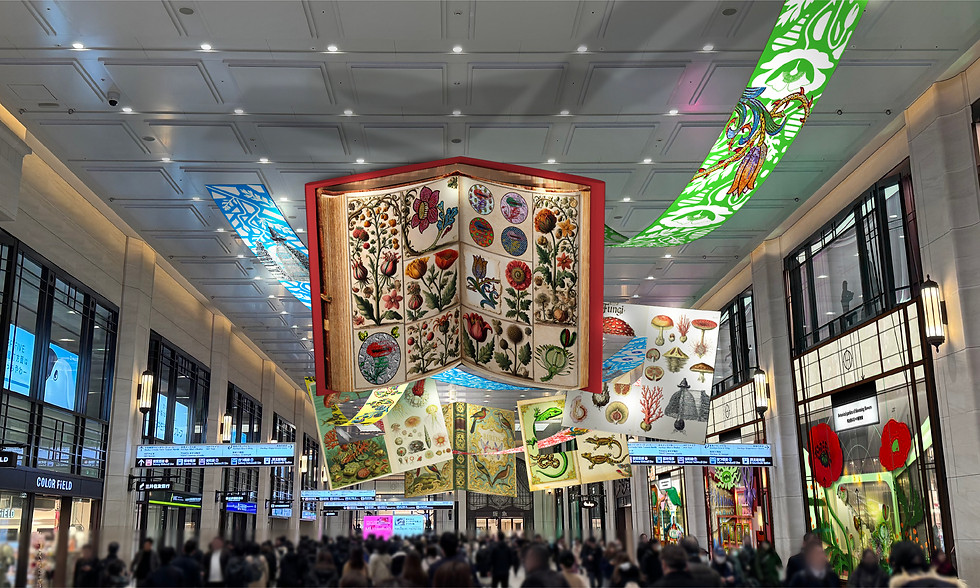 A giant book hangs from the ceiling of a mall as part of Osaka Art and Design 2025