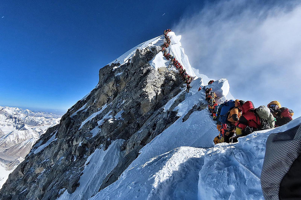 A queue to the top of the world, the summit of Mount Everest Photographer Suraj Pokhrel iS