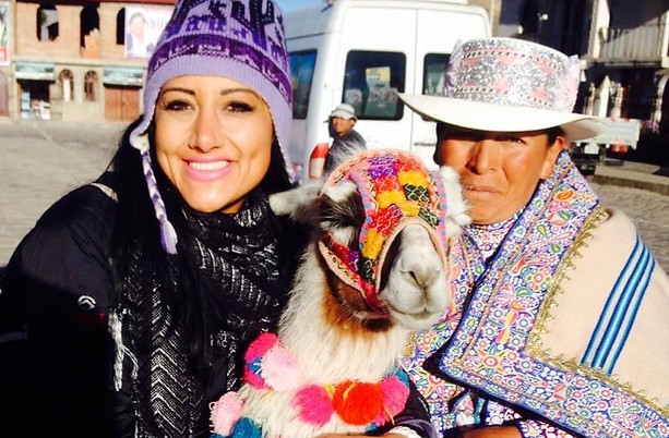 Anu and two friendly locals during her visit to Sacred Valley, Cusco, Peru