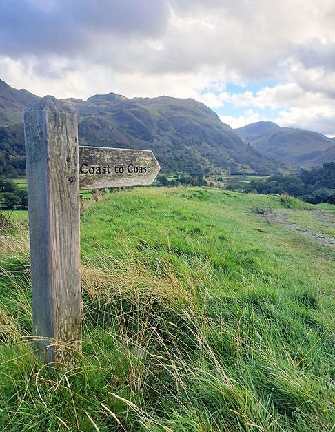 A sign pointing the way forward on the Coast to Coast walk RAW Travel