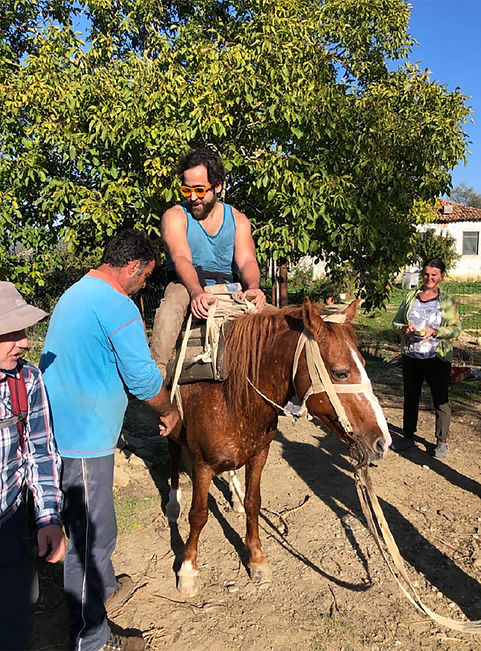 Alex riding a horse for the first time