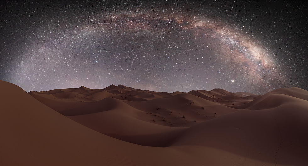 The awe-inspiring milky way galaxy over the sand dunes of Sahara Desert, Morocco