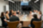 Conference room meeting with smiling ridgeline members