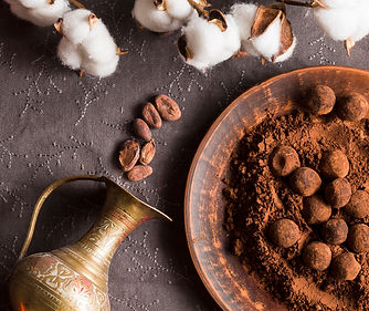 flat-lay-chocolate-truffles-in-cocoa-pow