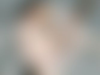 Woman standing outdoors with one arm raised, overlaid with a Human Design BodyGraph inside a circular frame.