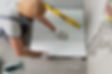 tiler-working-renovation-apartment.jpg
