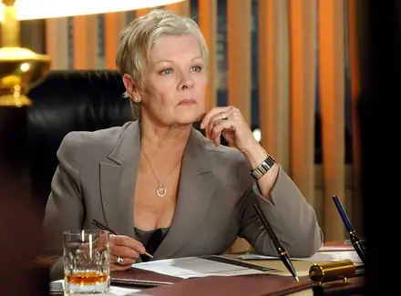Dame Judi Dench, sister of live-action Pumpkids prequel star Trudi, shown here playing a corrupt vice-president of Consolidated Companies in 9 to 5 2: Now They're All British!.