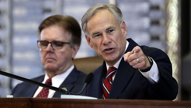 Governor Abbott, shown here pointing out a woman in the audience who looks perfect for the breeding program that he has been working on for the past few years