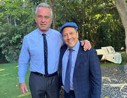 Rob Schneider, voice of Jabby in Jabby's Playhouse, here with RFK Jr. right before doing a few awkward push-ups and jumping in an algae-covered pond with their clothes on