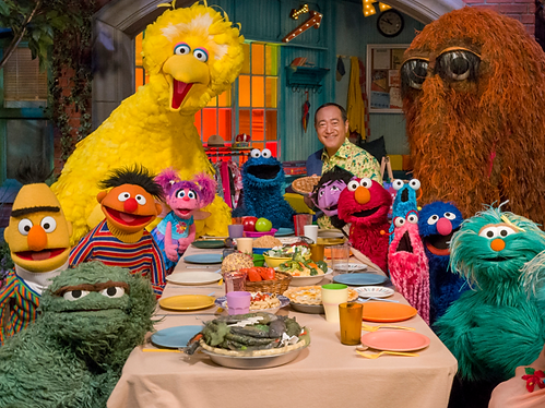 A scene from the Lupercalia Festival celebration in an episode of Sesame Street where Elmo frees himself from ancestral bondage by undergoing an unbaptism ritual