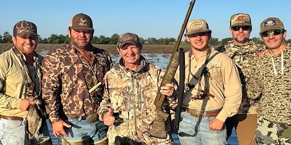 Governor Landry, shown here with a squad from the Louisiana National Guard preparing to ship out to Iran in that pirogue they borrowed from Bubba Comeaux's uncle T-Jim in Mamou