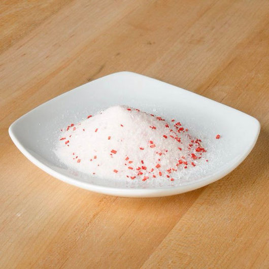 A stylish ceramic serving dish, shown here holding enough candy cane fentanyl to kill every man, woman, and child who plays Christmas music before Thanksgiving in Pittsburgh