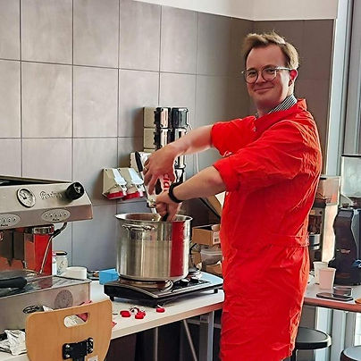 A bagel scientist in Pittsburgh, shown here proudly attempting to make a bagel by using boiling milk to gelatinize the dough prior to baking