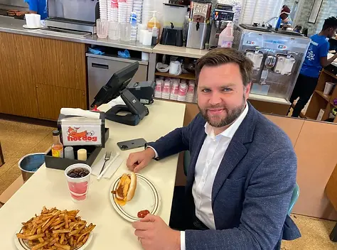 Normal human JD Vance, shown here eating a typical human meal that he ordered himself like a real American