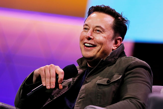 Musk, shown here laughing as he talks about the hilariously dangerous self-driving mode included in the latest Cybertruck update