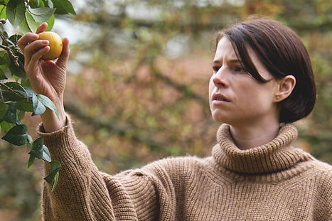 Jessie Buckley, shown here in an upcoming commercial for Apple Blossom Roundup® Dual Action Weed and Grass Killer