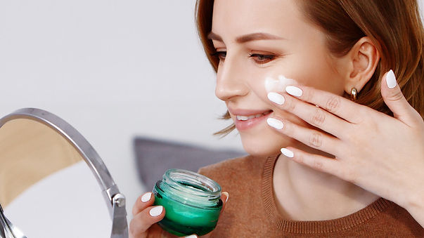 A 97-year-old woman, shown here during her daily application of a topical anti-aging cream made from bioresonant quantum nanoparticles of raw skink oil