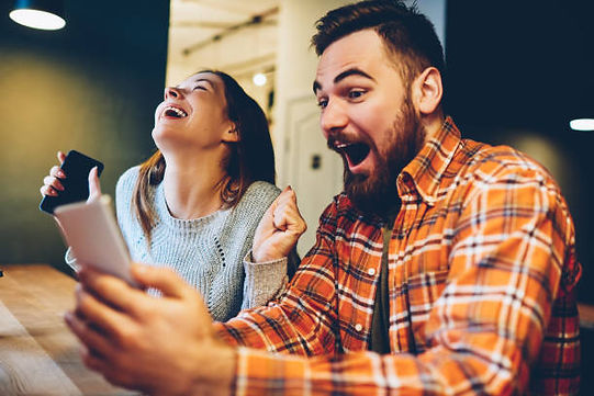 Online betting fan Sean Chad Kennedy Michael and his wife, shown here feeling the extreme rush of losing their child's college fund