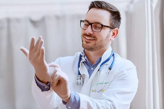 A physician, let's just call him Steve, shown here donning a pair of gluten-free gloves before performing a routine plectal scraping on a patient suffering from tertiary grimp