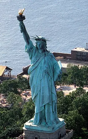 A husbandless Statue of Liberty, overcome with loneliness and incapable of protecting America from giant monsters