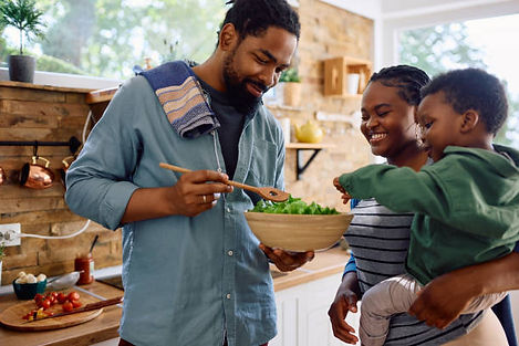 A man, shown here preparing a family meal. What's that? Didn't think a man could do that? Or is it just because he's black? You are part of the problem!