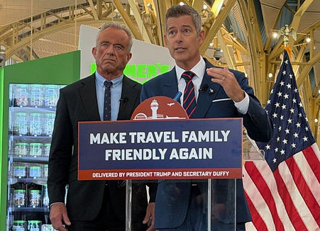 Secretary Duffy, shown here discussing the proper way for a woman to insert a tampon while Secretary Kennedy mentally prepares himself for a run through "The Obliterator" obstacle course