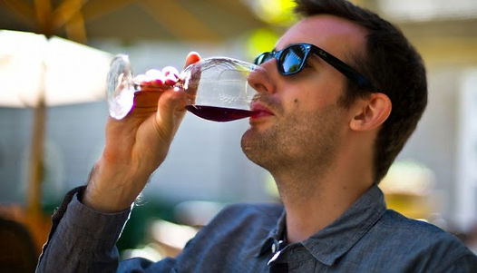 Southerland, shown here tasting the gooseberry mere moments before being ripped apart by fellow wine tasters so that they might feed upon his brain stem and olfactory cortex to acquire his unique and powerful wine tasting abilities