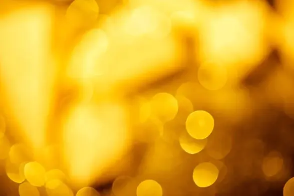 depositphotos_210865706-stock-photo-golden-festive-bokeh-black-background.jpg