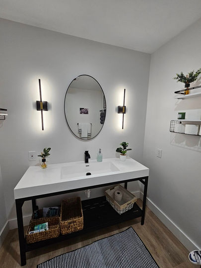 Image displaying a remodeled bathroom by HS Premier Construction Services LLC.