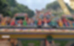 The beautiful and colorful carvings at the welcome arch of Batu Caves.