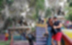 Climbing the colorful stairs at Batu Caves